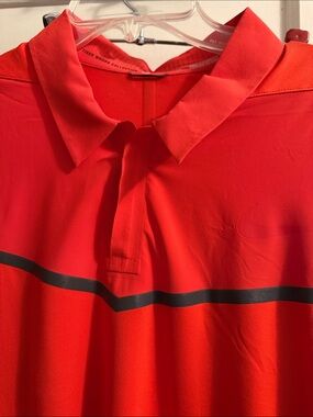 Nike Men’s Tiger Woods Collection orange Polo with Black Horizontal Stripe